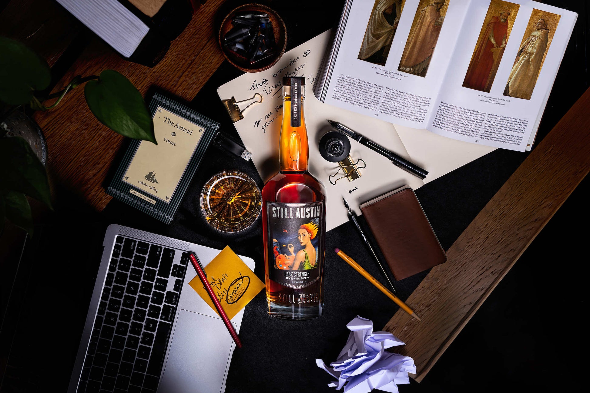 Still Austin Cask Strength Rye Whiskey sitting on a desk